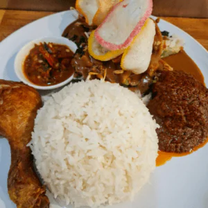 Nasi Rames (Steamed Rice with Fried Chicken, Beef Rendang & Vegetables in Peanut Sauce)