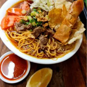 Soto Mie (Noodles, Beef, Cabbage & Spring Roll in Clear Soup)